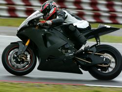 Motorbike going around the track