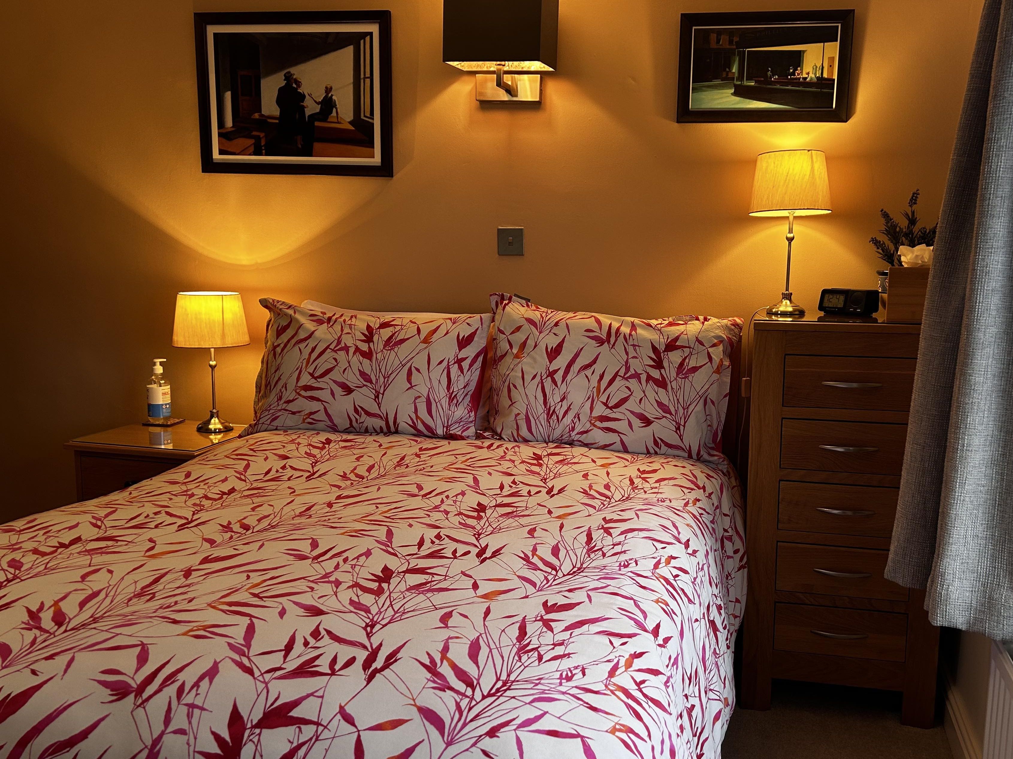 Double bed and side tables of Bedroom 2