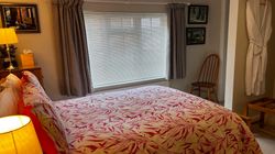 Bed and window from entrance to Bedroom 2