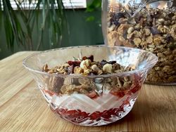 homemade compote, Greek style yoghurt, homemade granola and Lincolnshire runny honey in a glass bowl