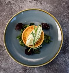 A tart displayed on a plate.