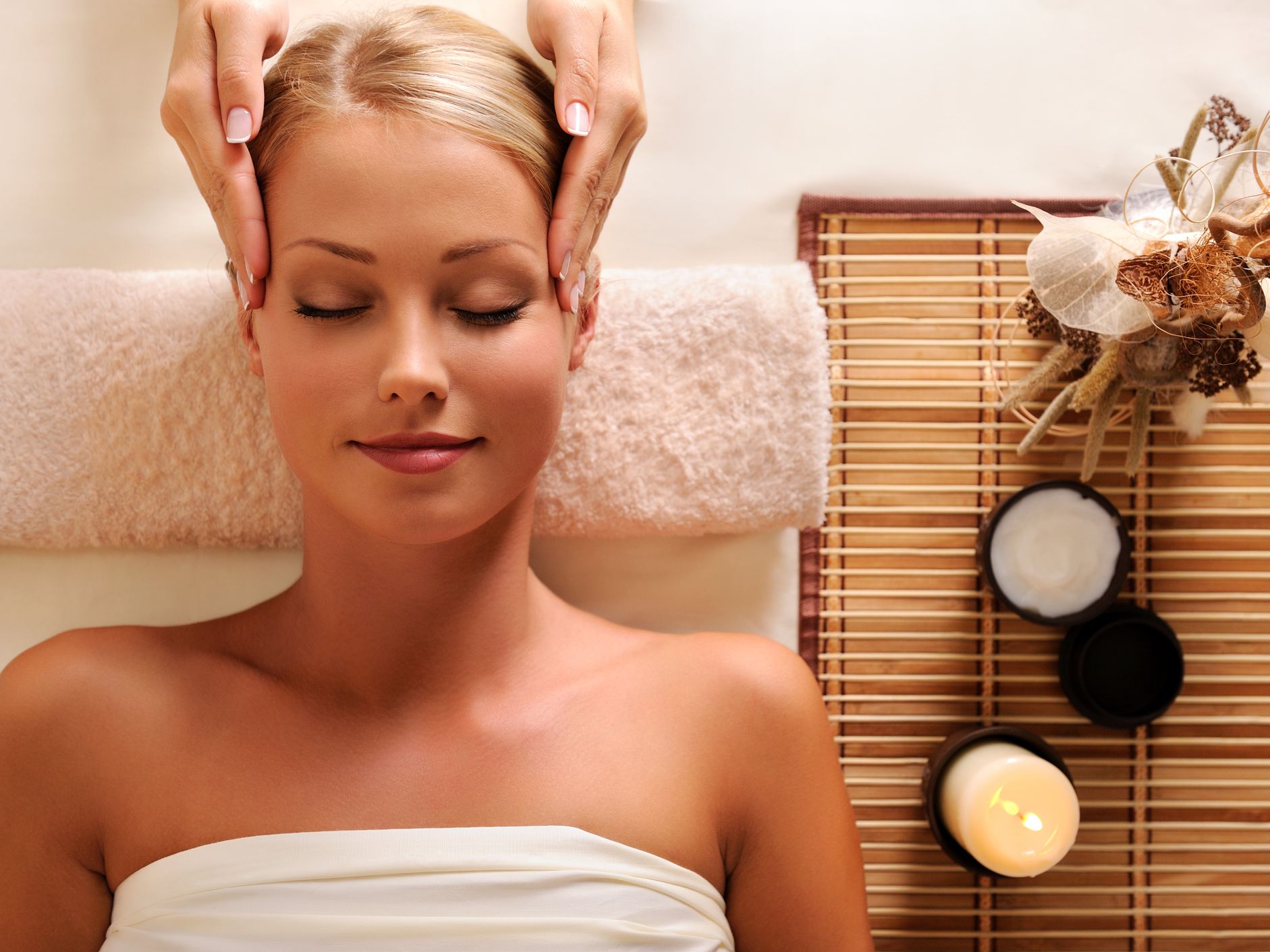 Women getting a head massage