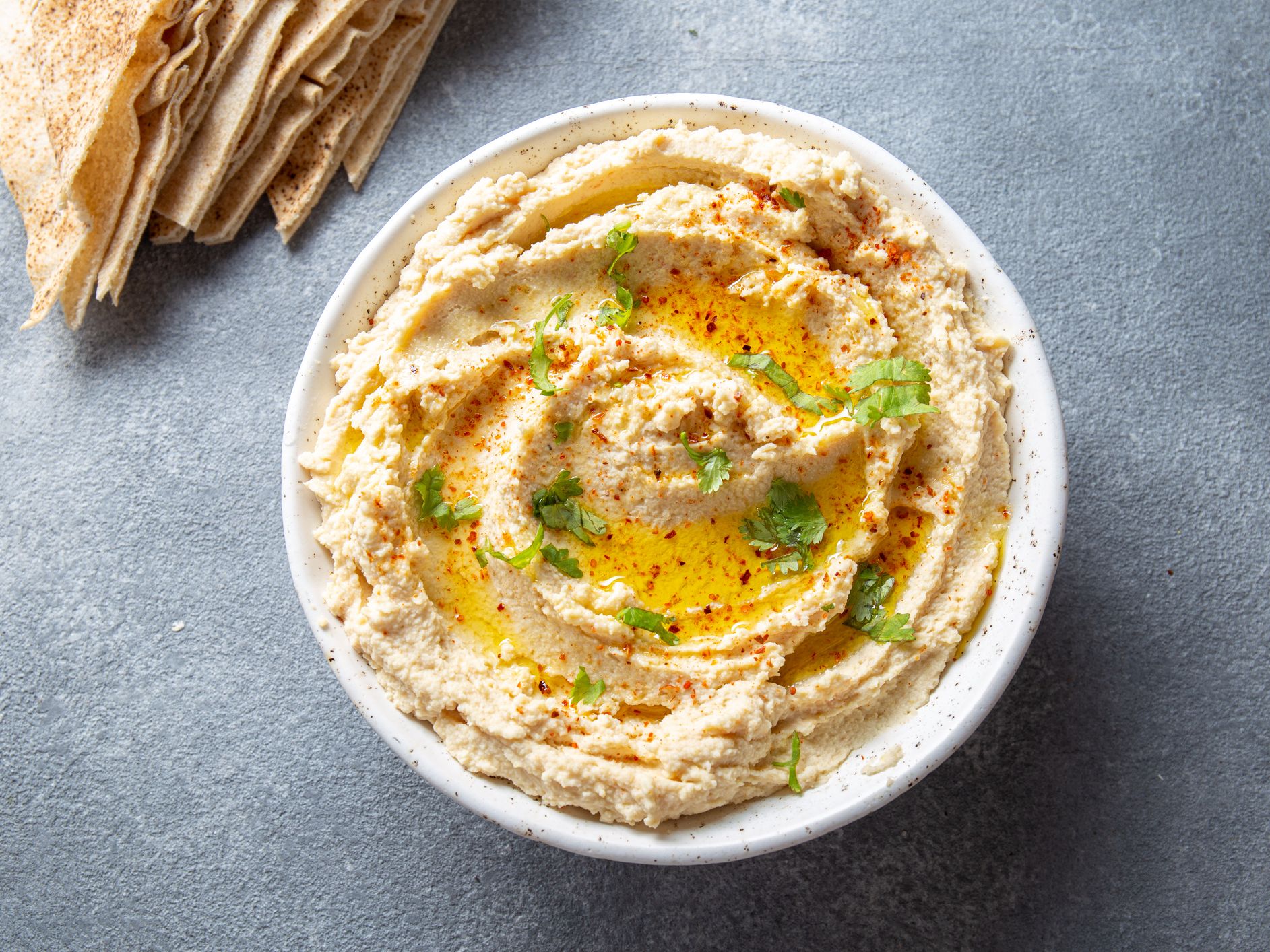 Bowl of Houmous with Olive Oil and Cracked Black Pepper