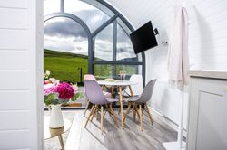 View over hills from glamping pod
