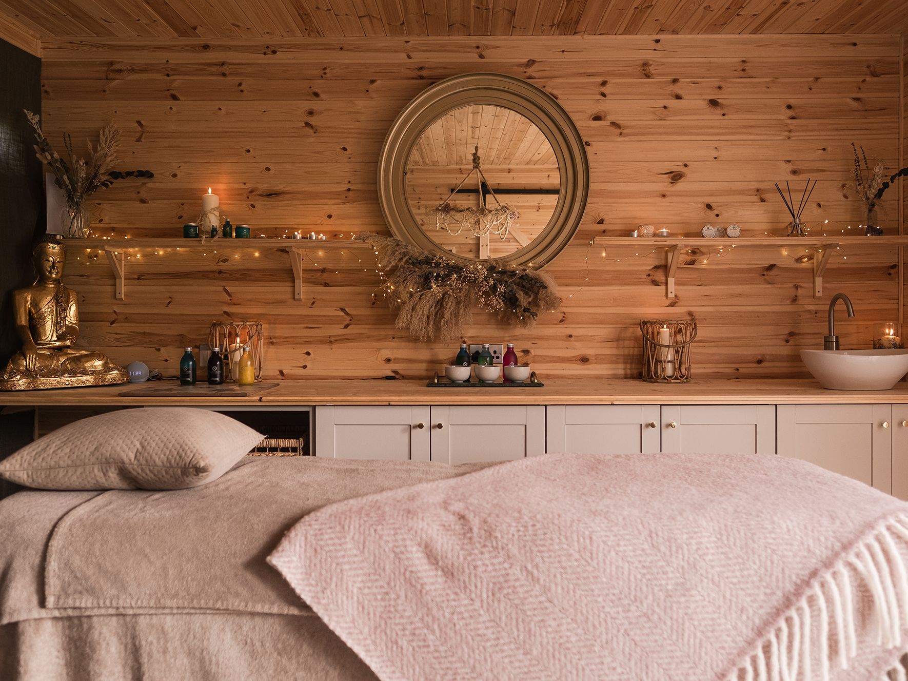 Spa treatment room with products on counter
