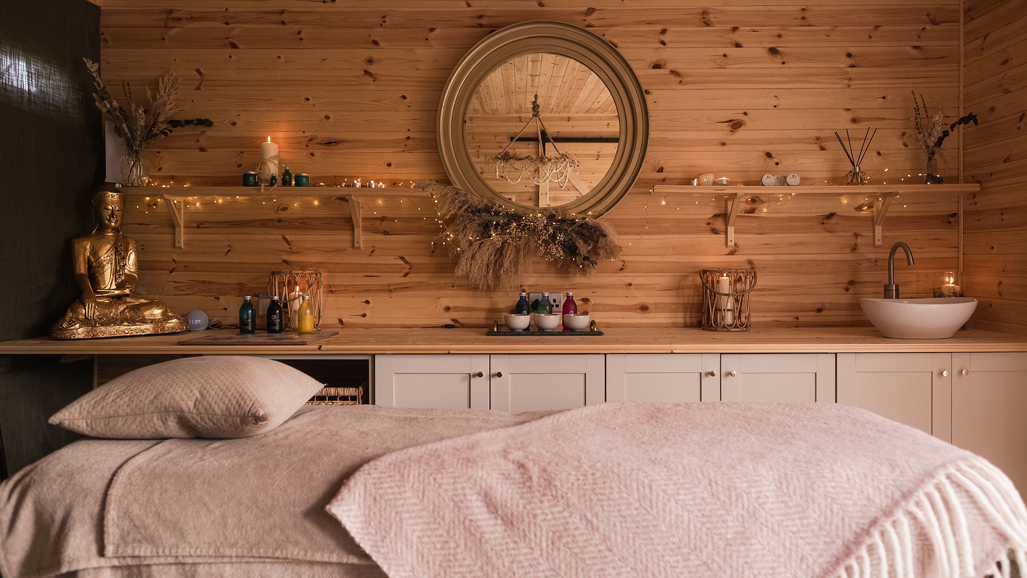 Spa treatment room with products on counter