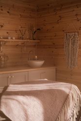 Blanket on bed in spa treatment room
