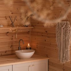 Candle by sink in spa treatment room