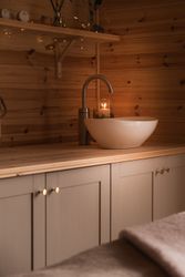 Candle by sink in spa treatment room