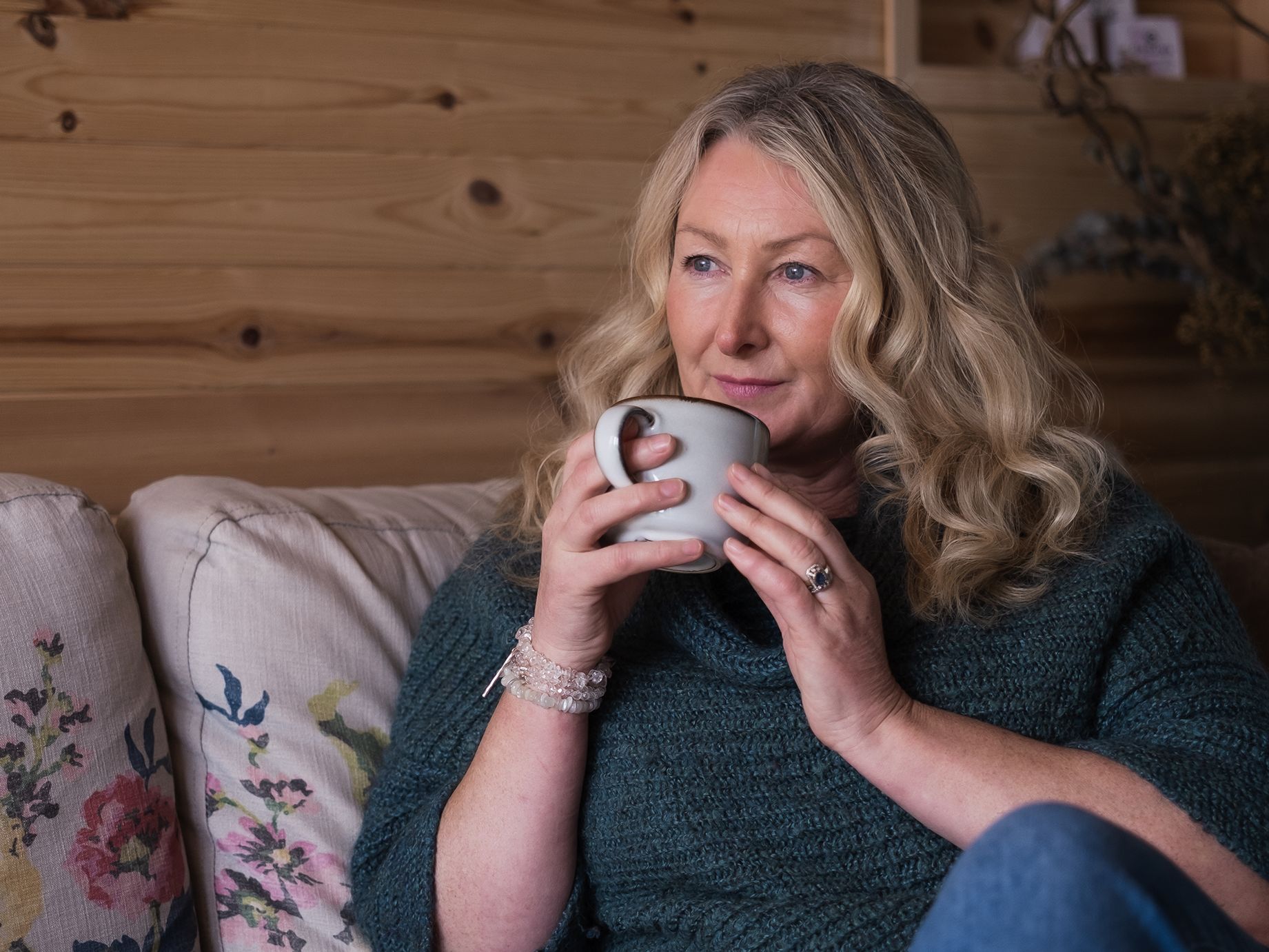 Denise, spa manager, drinking cup of tea