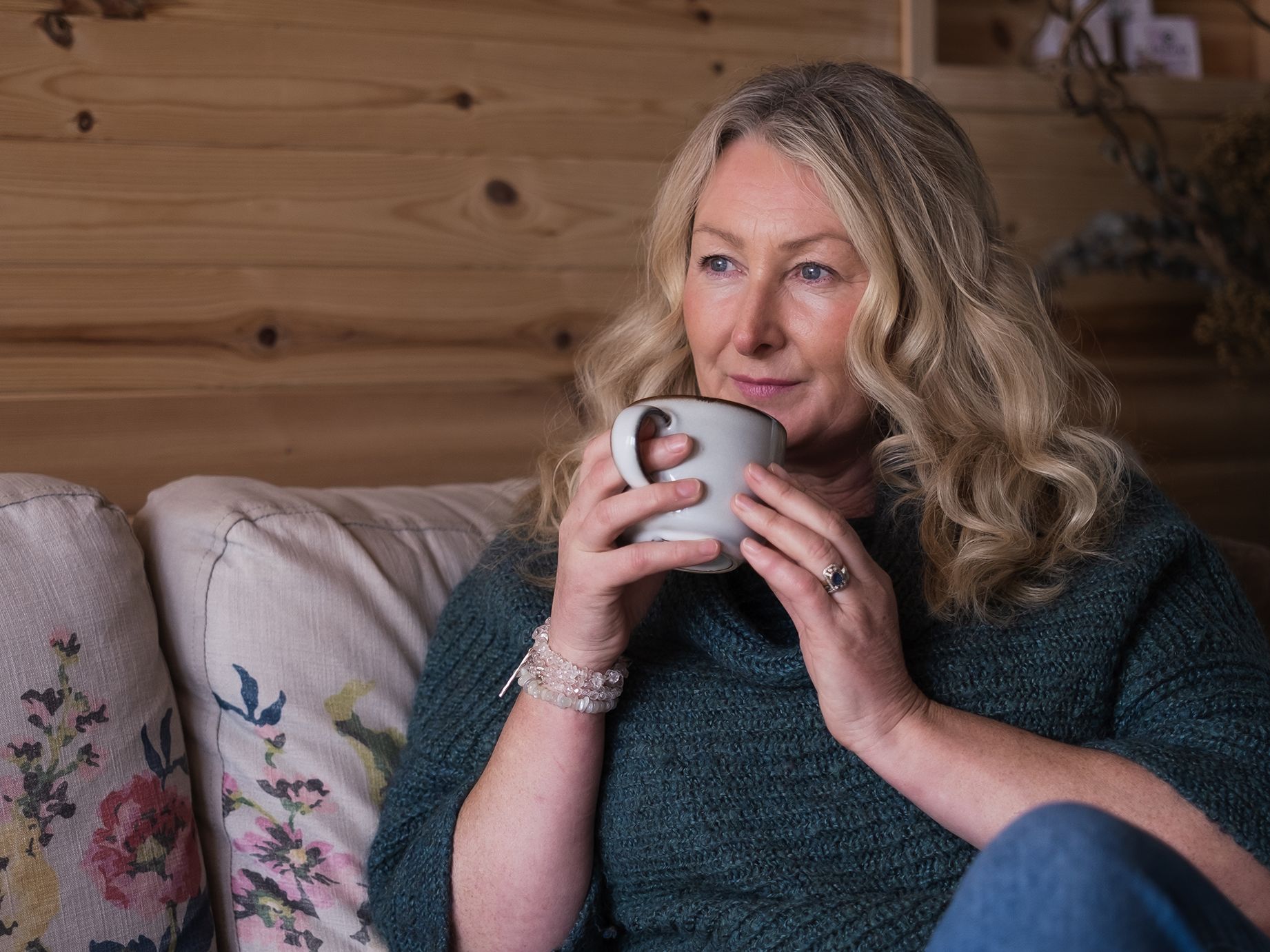 Denise, spa manager, drinking cup of tea