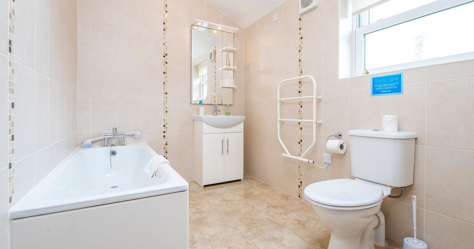 hirwaun cottage bathroom with bath and freestanding shower