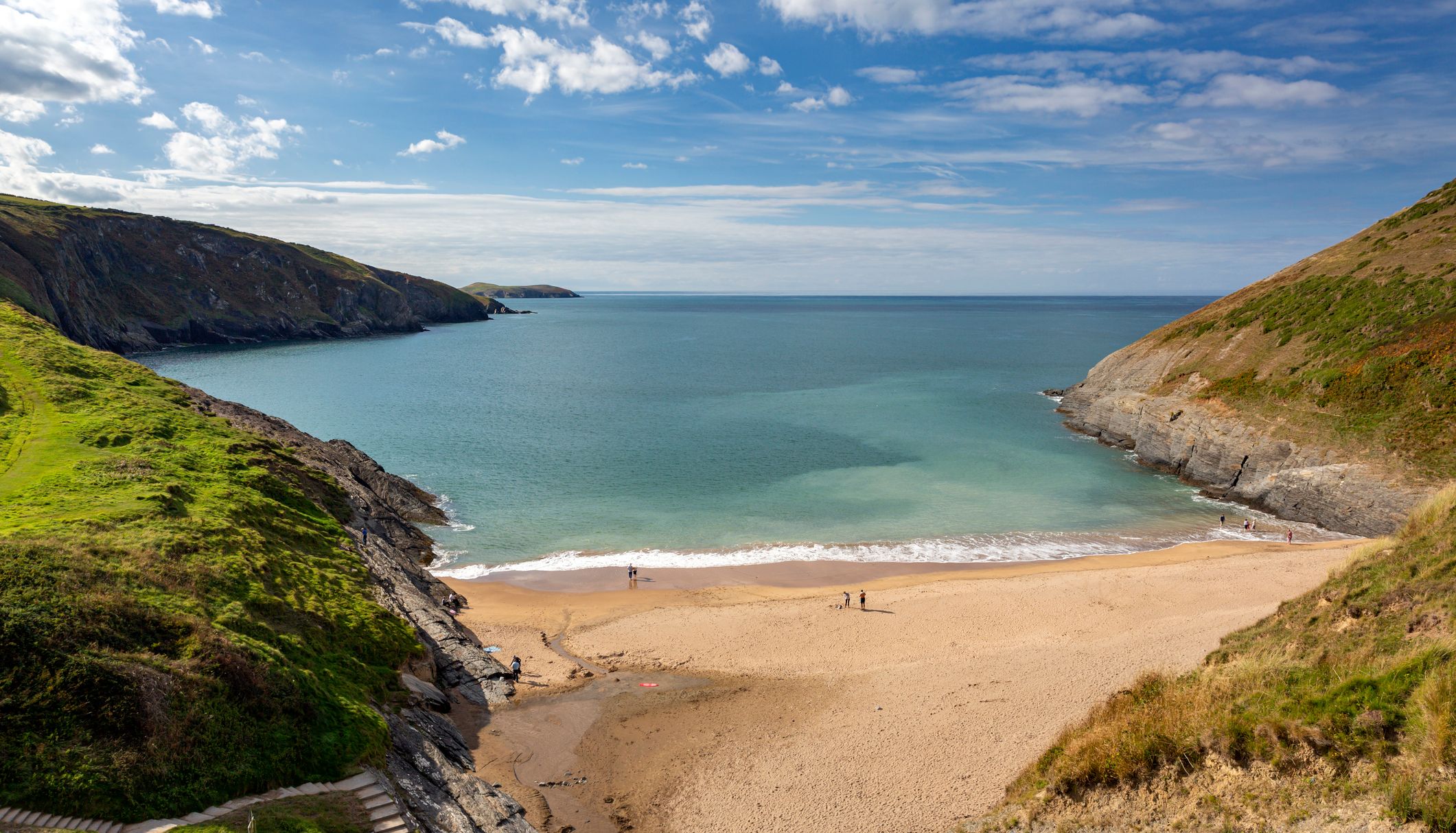 a small cove in wales that makes up part of the wales coastal path