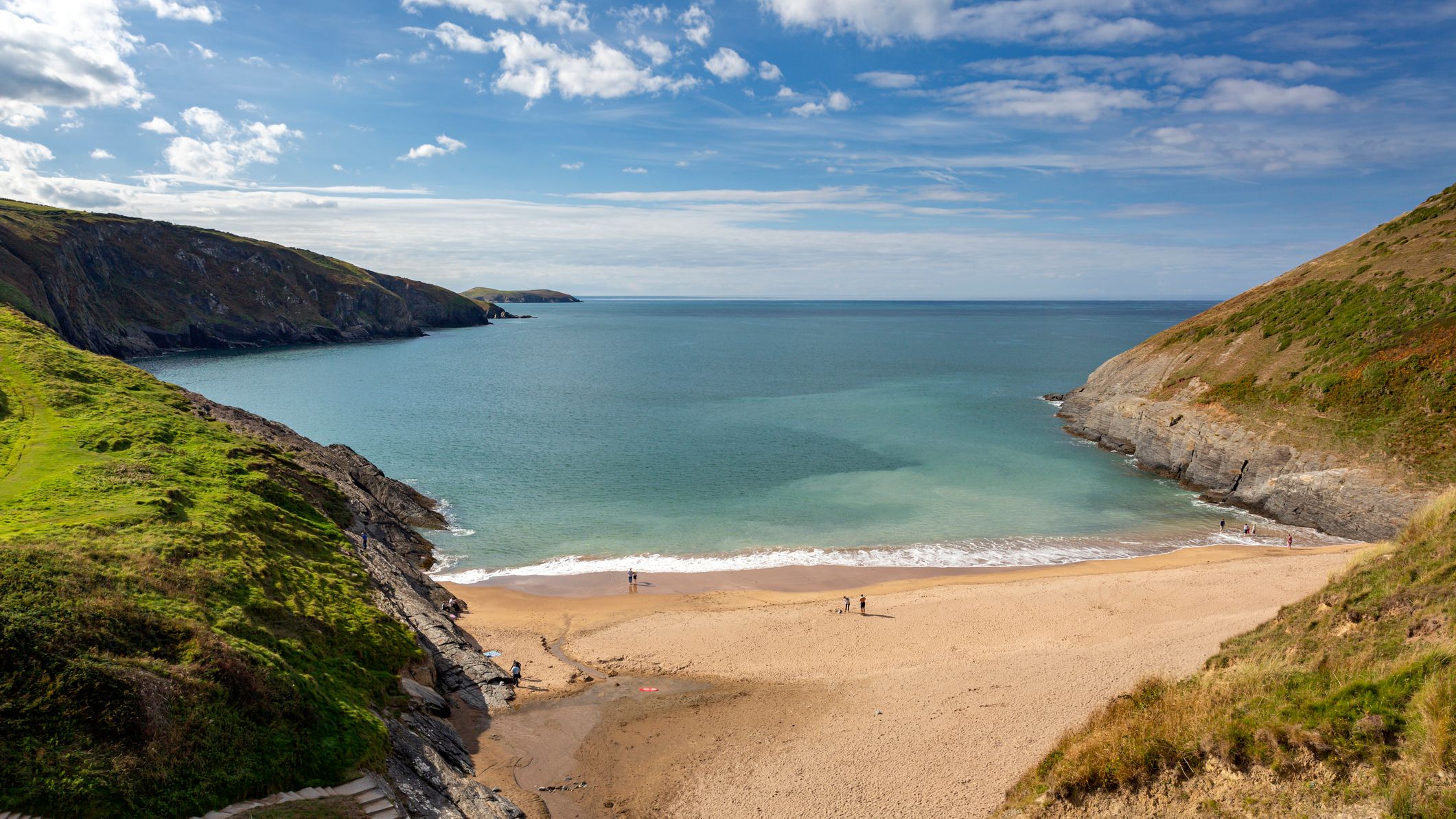 a small cove in wales that makes up part of the wales coastal path