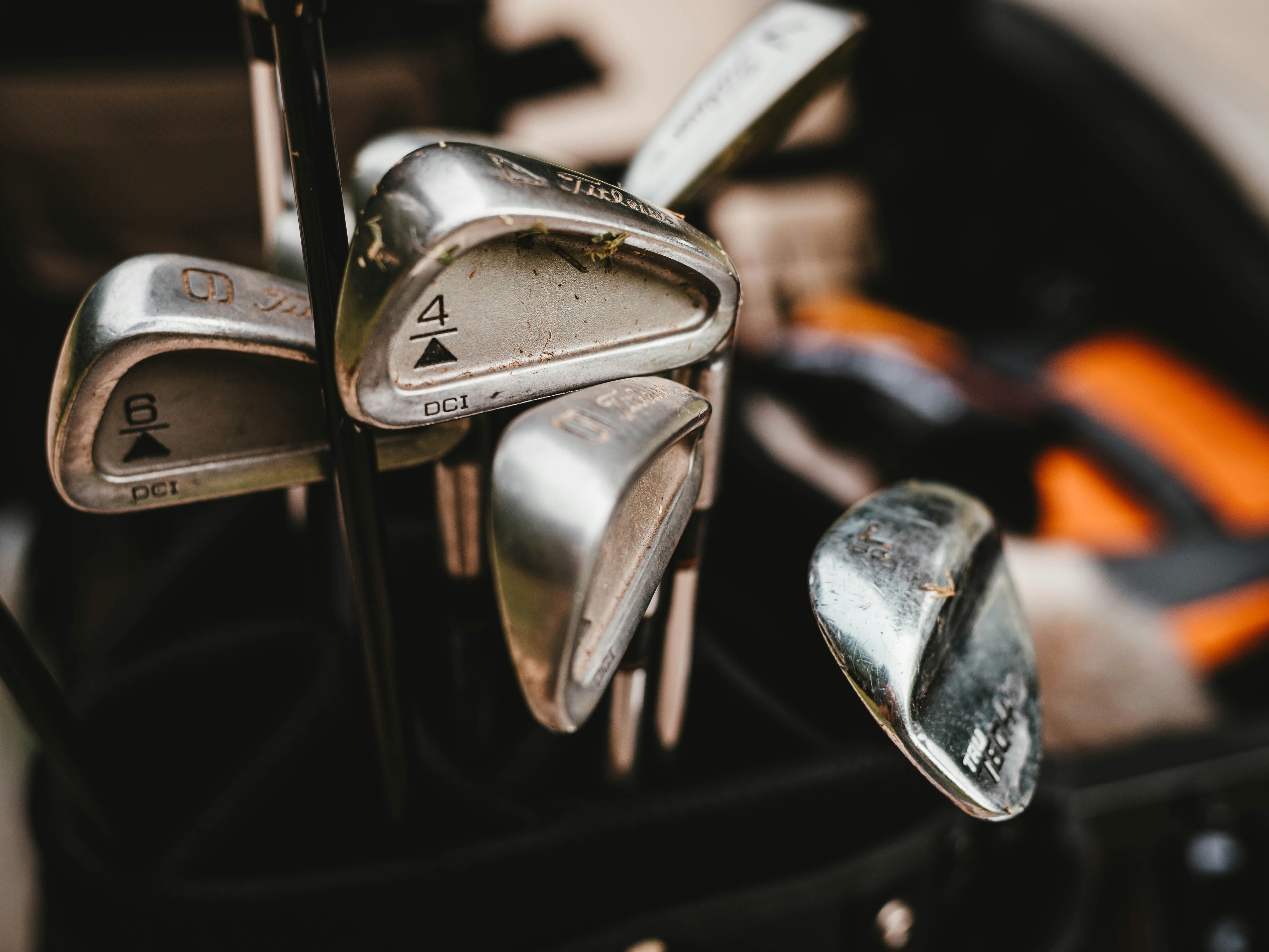 Close-up of golf clubs in a golf bag