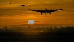plane-landing-at-sunset