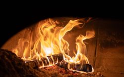 Fire burning in oven poco pizza