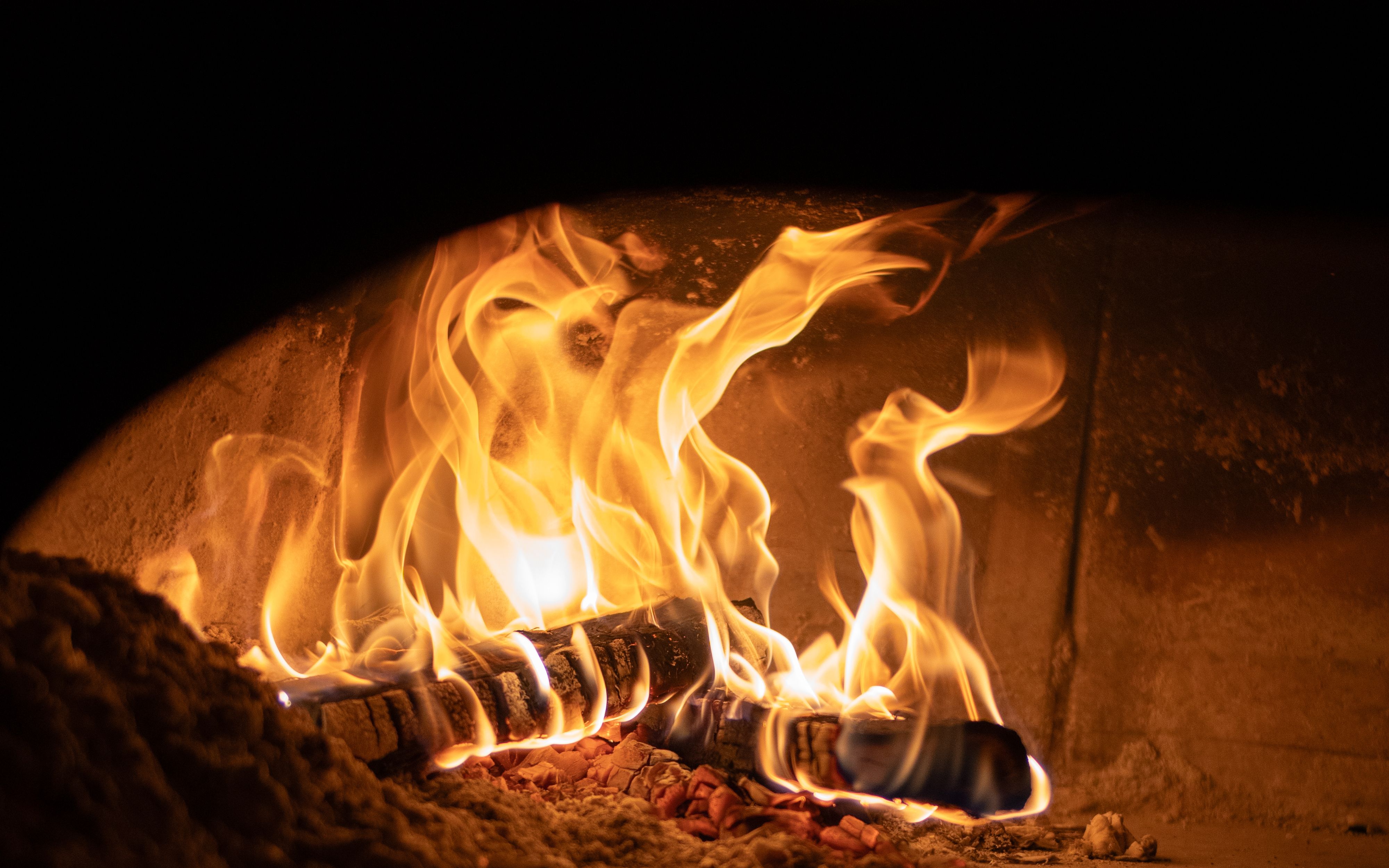 Fire burning in oven poco pizza