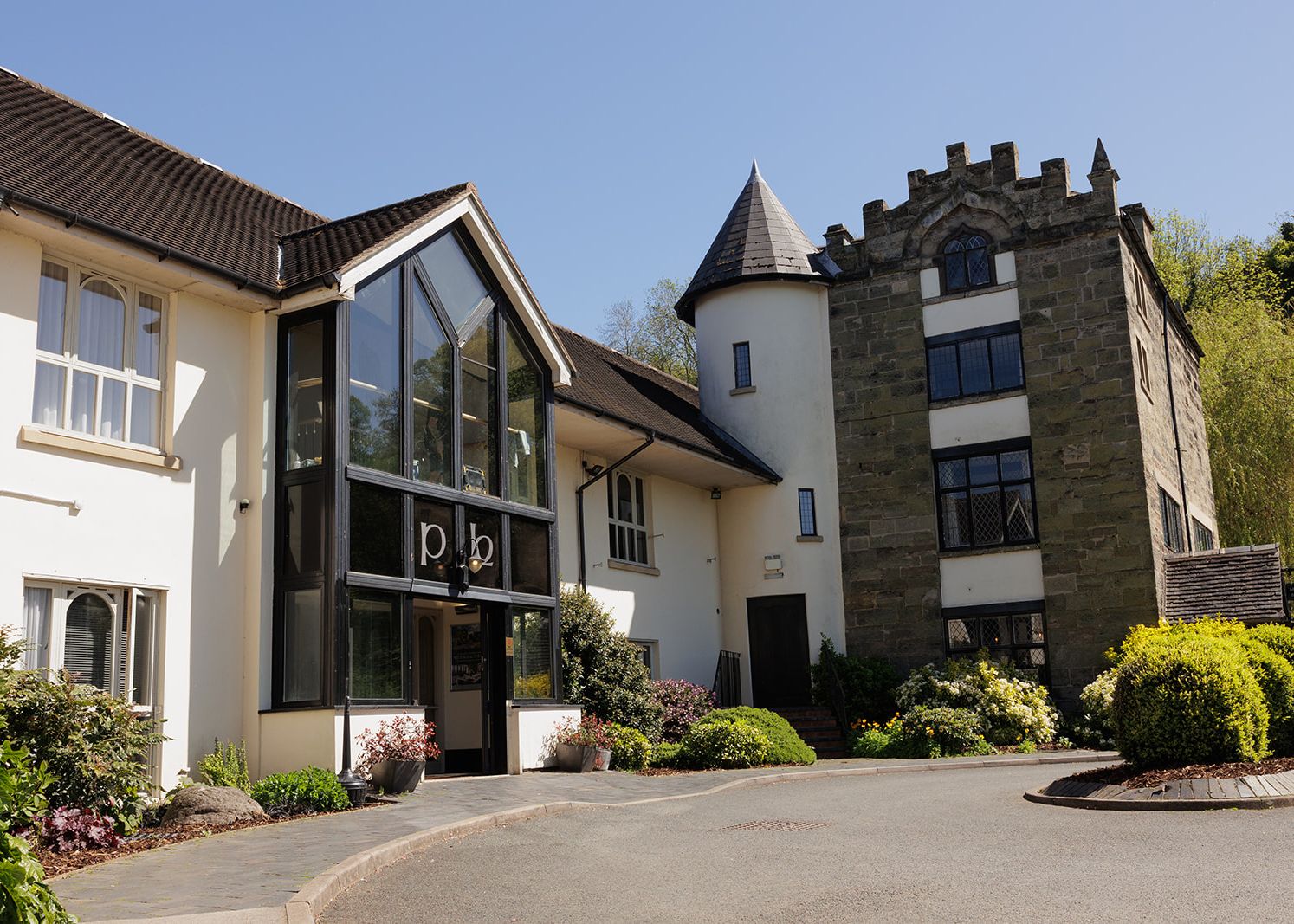 Exterior view of The Priest House, featuring modern and historic architectural elements.