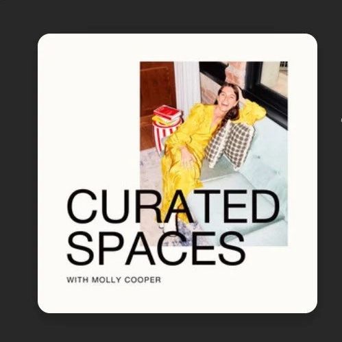 A woman in a bright yellow outfit sitting on a couch, smiling, with the text 'Curated Spaces with Molly Cooper' over the image.