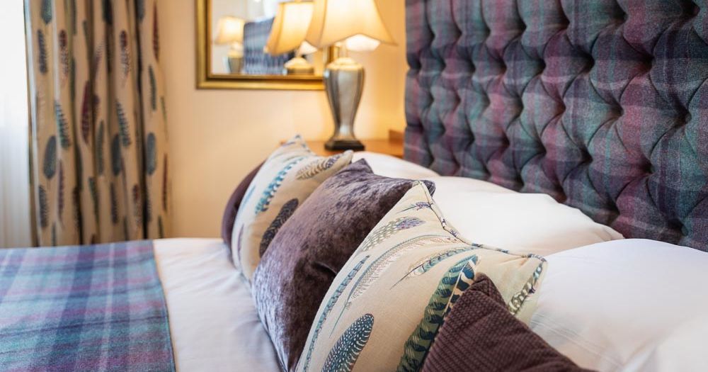 Purple, White and Blue double bed room