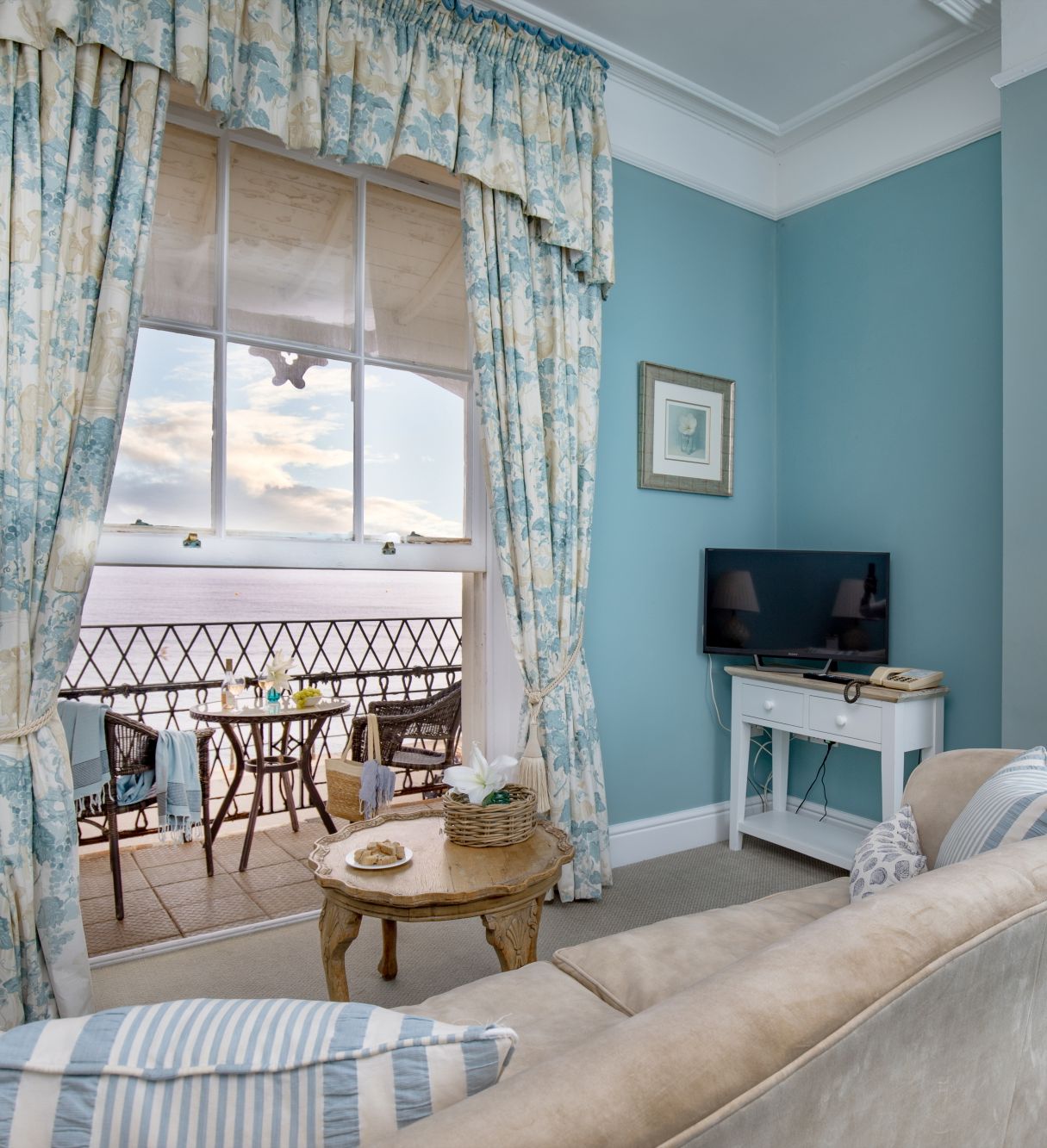 Spacious lounge with doors out to a private balcony