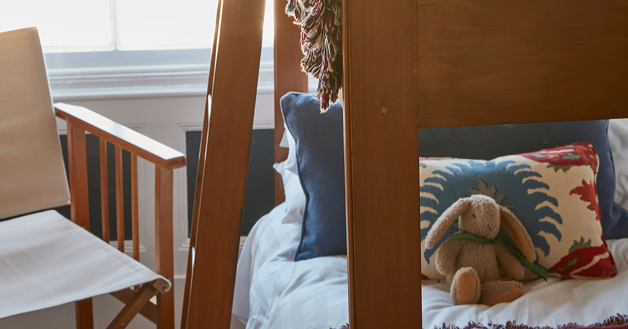 Set of Bunk-beds and a chair in a room
