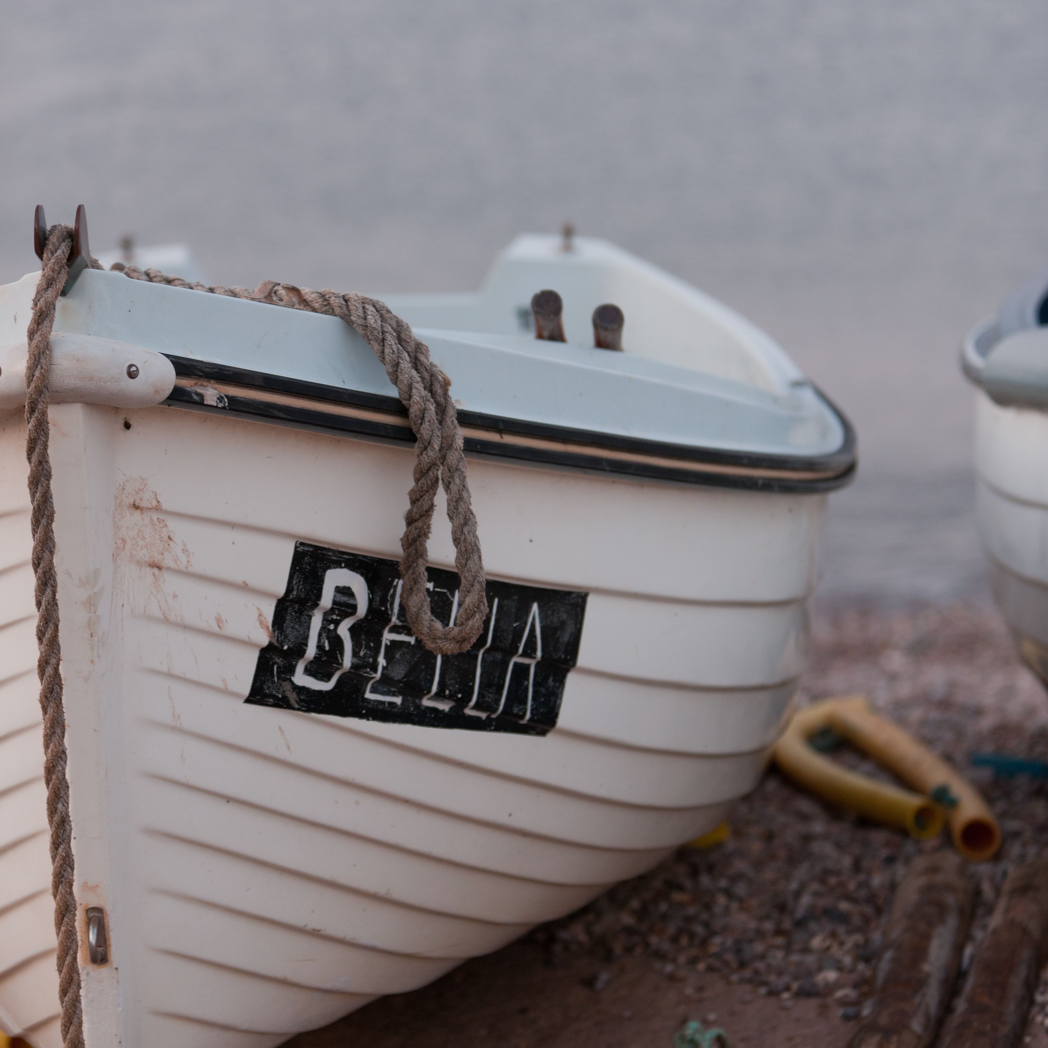 White boat on a beach