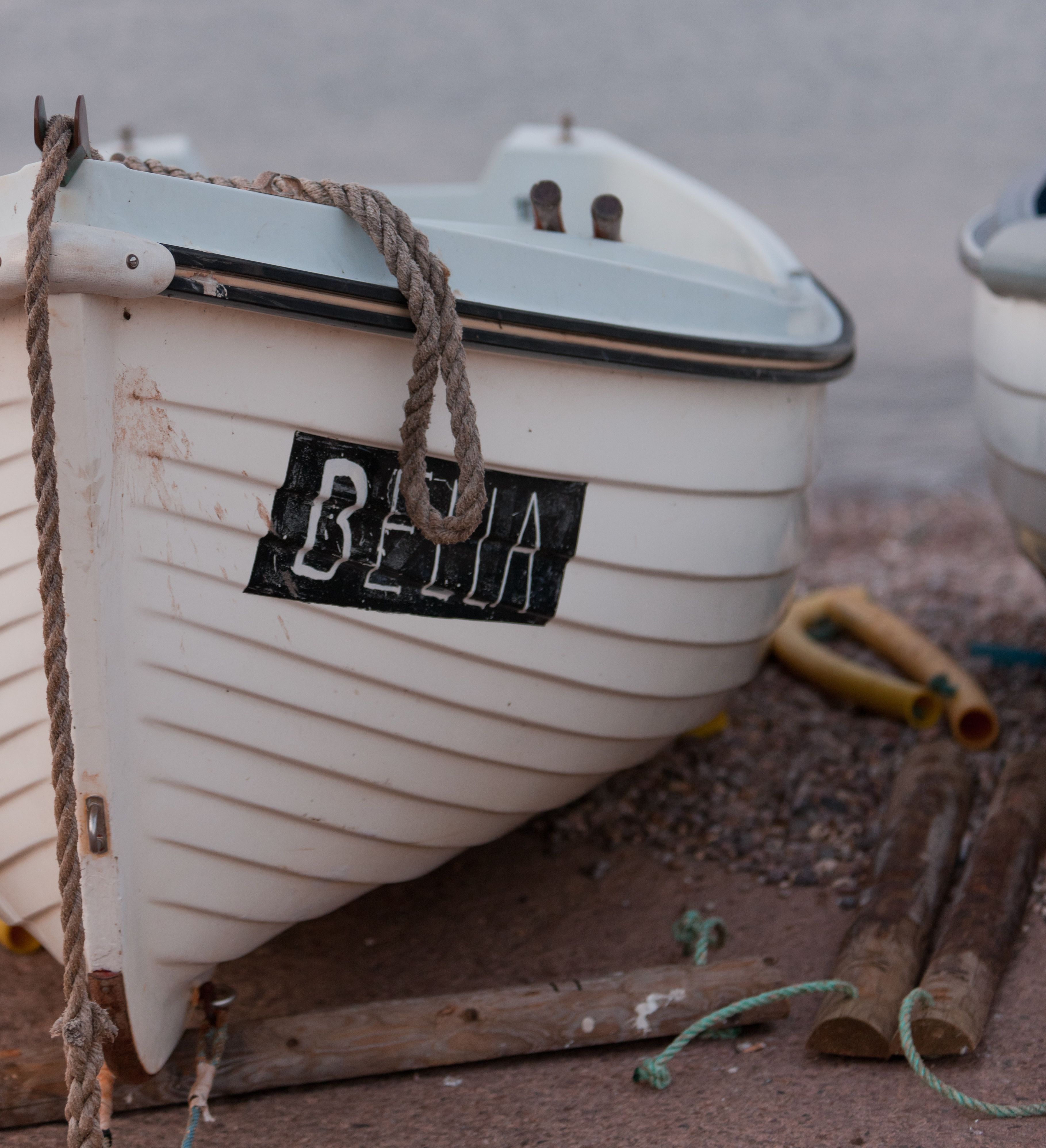 White boat on a beach