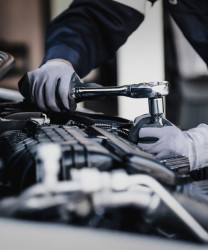 Mechanic with Car Parts