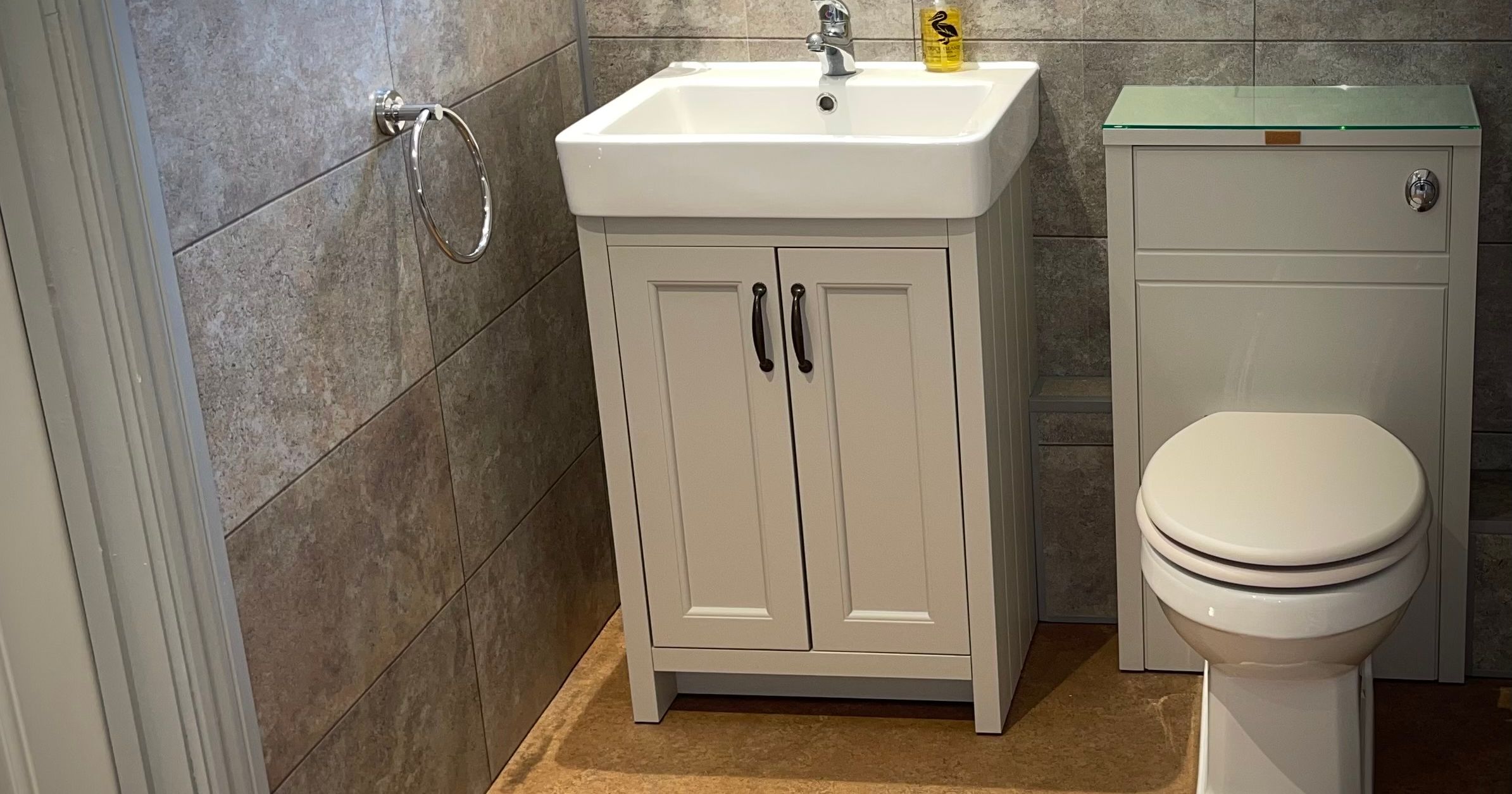 Modern bathroom with sink vanity and toilet