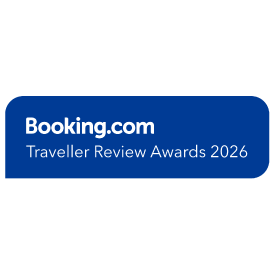 Booking.com Traveller Review Awards 2026 badge on a dark background