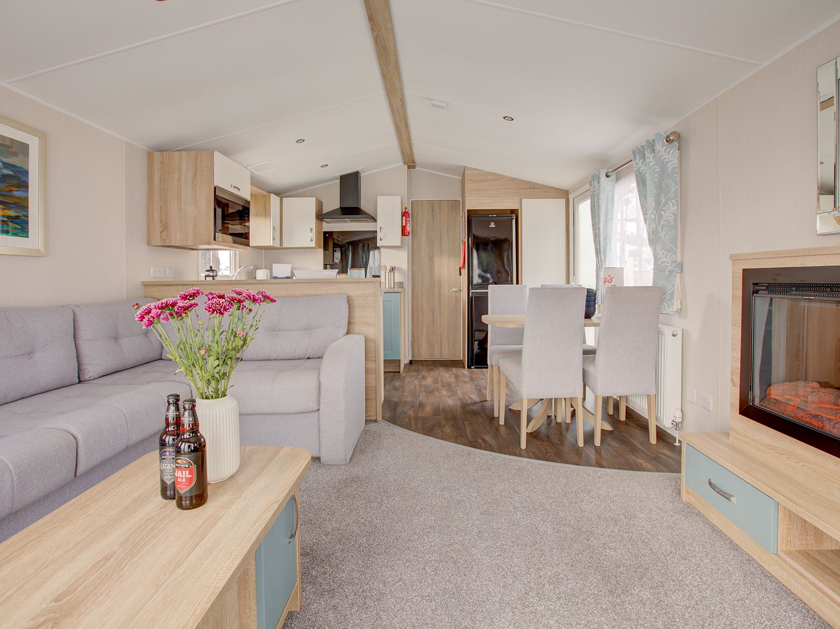 Lounge with sofa and fireplace in view