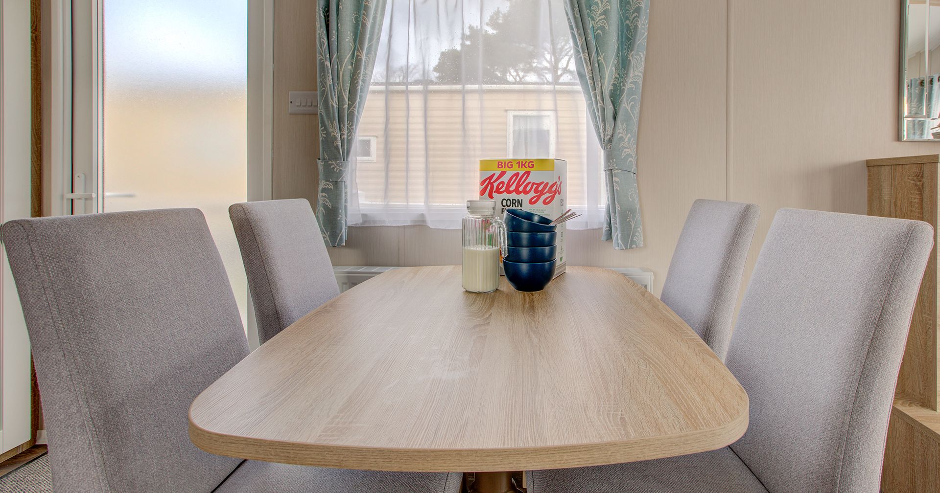 Dining table with cereal on table