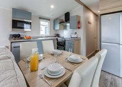 Modern kitchen and dining area in a compact living space