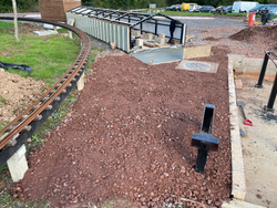03/10/2024 The ground around the edge of the steaming bays raised and levelled prior to the installation of the changeover mechanism to the carriage shed.