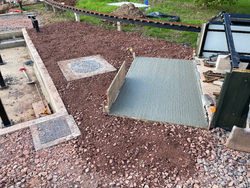 03/10/2024 A new hardstanding cast at the end of the raised track carriage shed to take the changeover mechanism from the traverser.