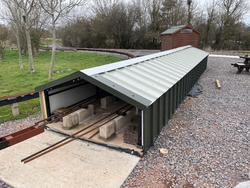 27/03/2025 The cladding on the raised track carriage shed almost complete.