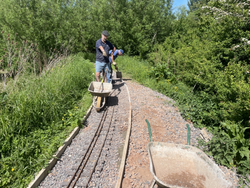 15/05/2025 The embankment alongside School Lane repaired, kerbs replaced and re-ballasted.