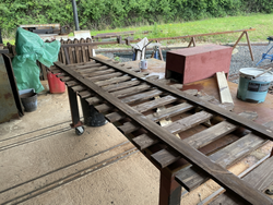 05/06/2025 Mass construction of picket fencing in progress.