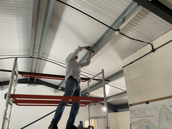 31/07/2025 Work has started on the suspended ceiling for the meeting room, with the first brackets being attached to the roof.