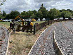 31/07/2025 The fencing being installed around the edge of the ground level track.