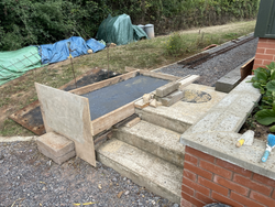 28/8/25 The loco off loading ramp next to the club house being raised to make off loading easier.