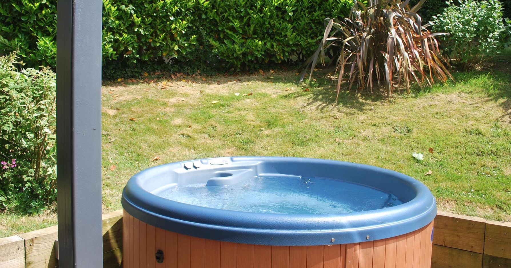 Outdoor hot tub in a garden
