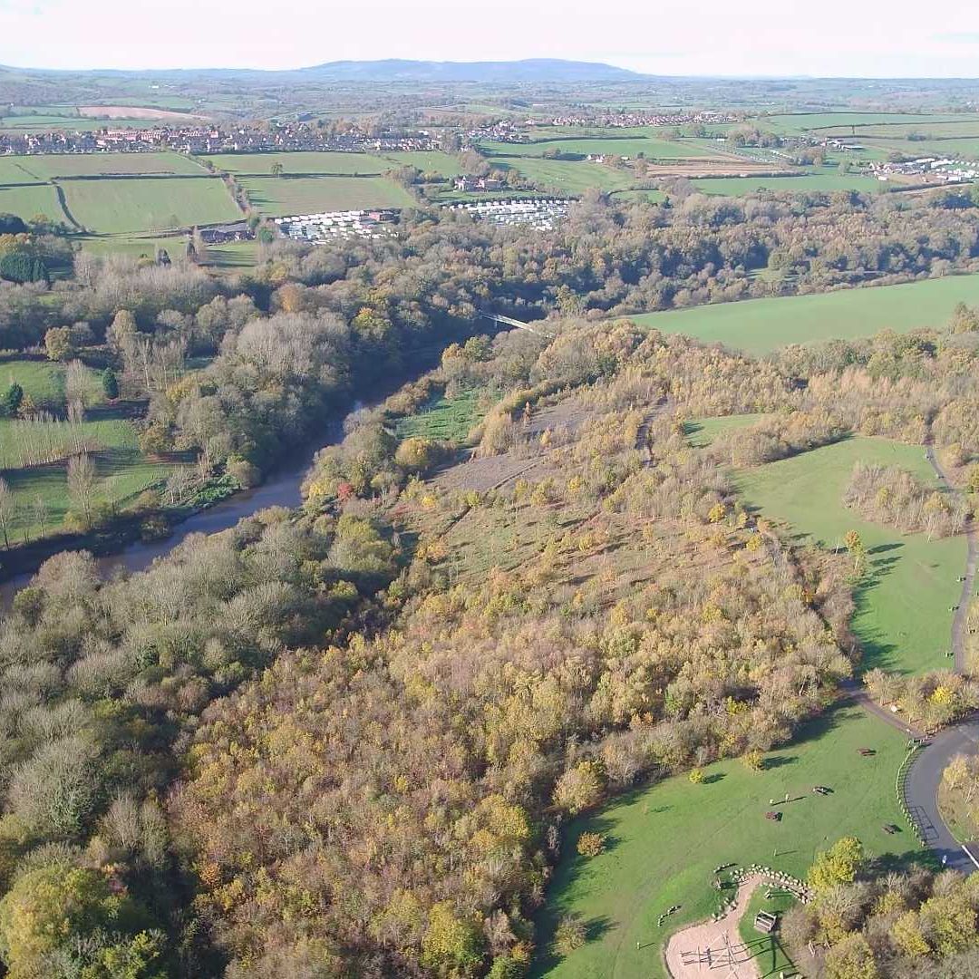 Aerial view of Severn Valley Country Park with fields, woodland, river, and facilities visible.