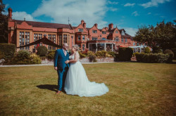 Bride and groom in hotel gardens