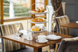 Afternoon tea stand with champagne
