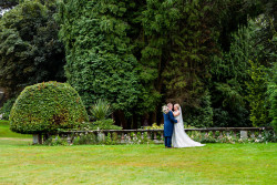 Bride and groom in gardens