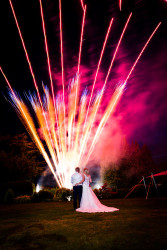 Bride and groom with fireworks