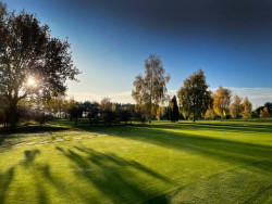 morning sun over golf course